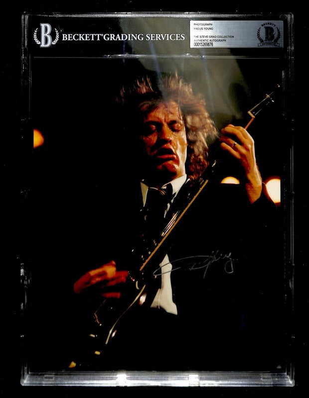 Angus Young AC/DC Signed 8X10 Photograph BECKETT (Grad Collection)0